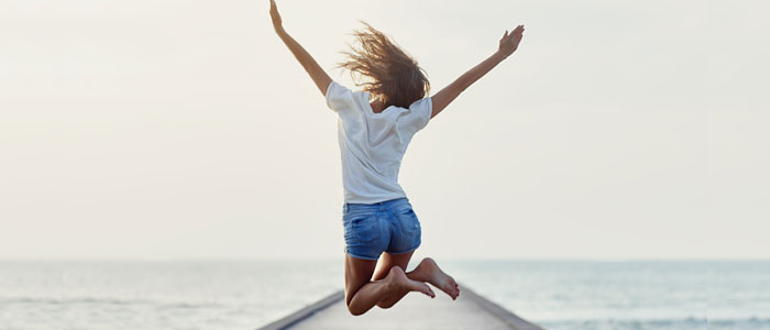 happy woman jumping